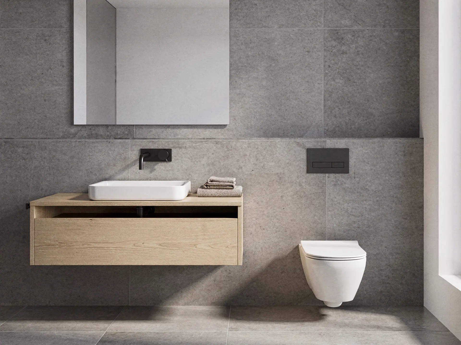 Wall-hung toilet with concealed cistern and floating oak vanity with wall-mounted black faucet