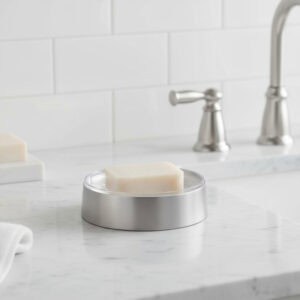 Minimal soap dish on marble bathroom countertop
