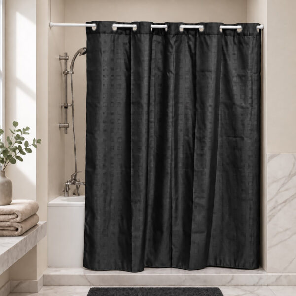 Black extra long hookless shower curtain hanging on a rod in a bright bathroom with a bathtub