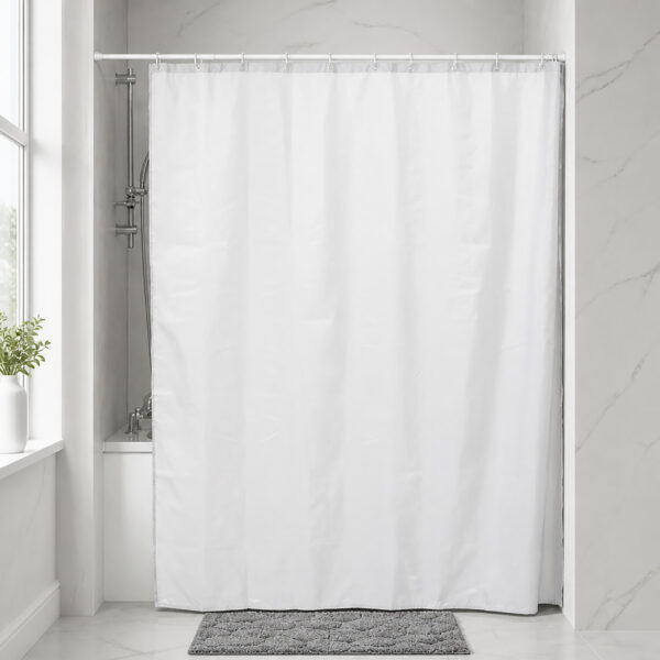 White polyester shower curtain installed across a bathtub in a hotel style bathroom