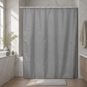 Grey polyester shower curtain in a modern bathroom with a white bathtub
