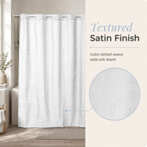 Close-up of the textured satin finish and cubic dotted weave on the white polyester shower curtain