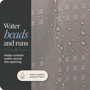 Water droplets beading and running down the water resistant taupe polyester shower curtain fabric
