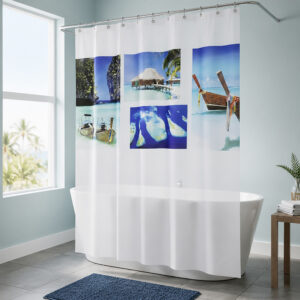 PARADISE beach shower curtain hung beside a freestanding tub in a light coastal bathroom