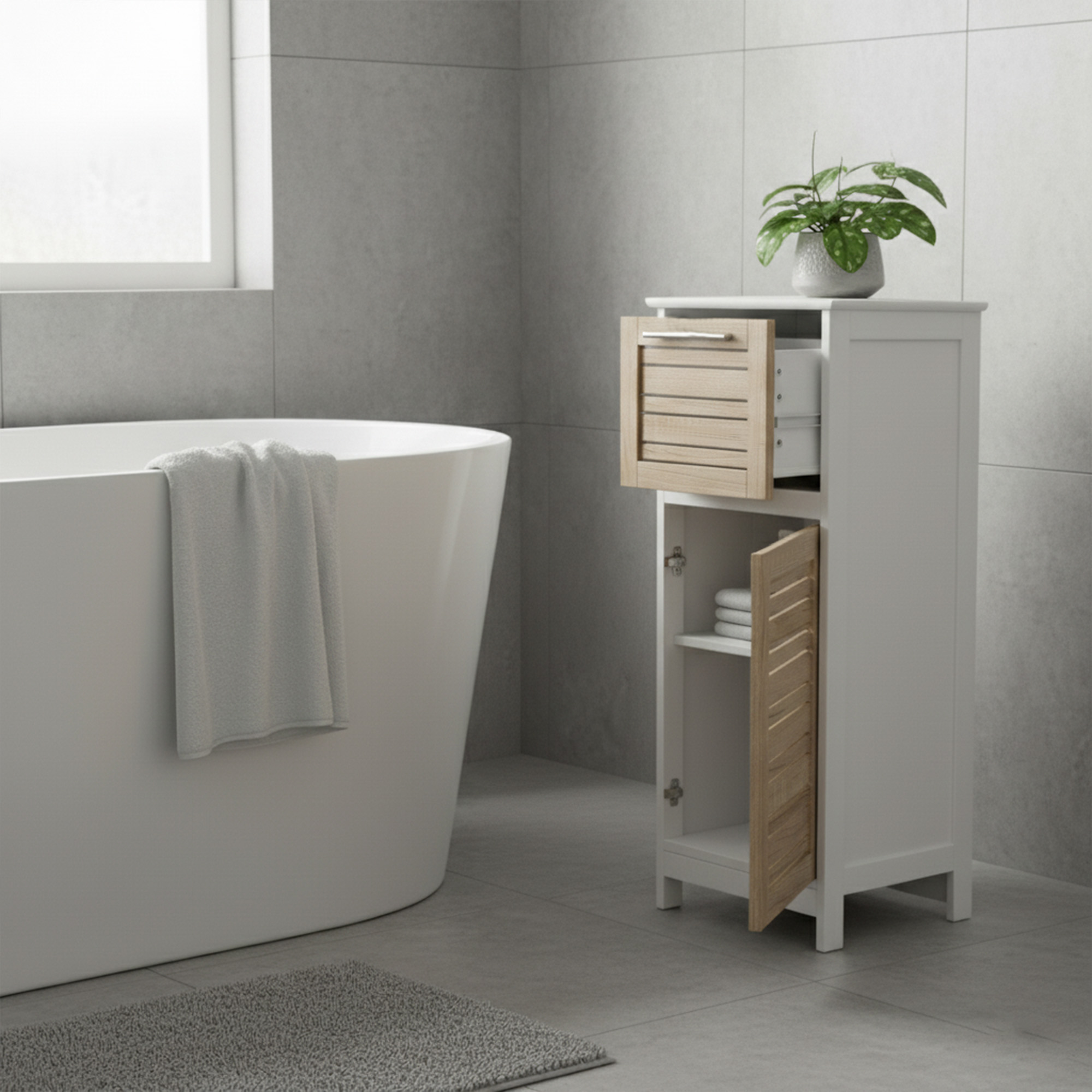 "Compact bathroom storage cabinet with open vented drawer and door, shown next to a freestanding bathtub"