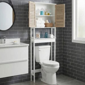“White over-the-toilet storage unit with wood-look doors open in modern dark gray bathroom”