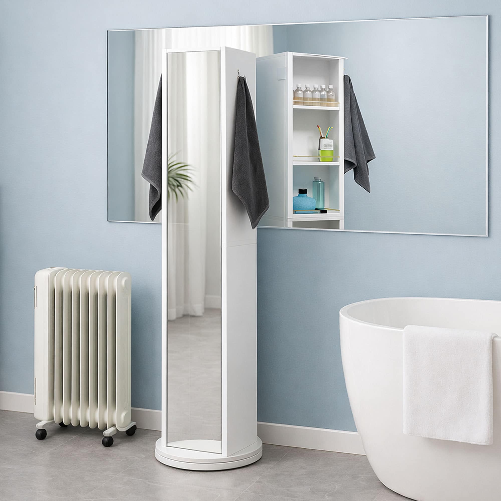 "White rotating floor storage cabinet with five open shelves holding toiletries and towels, with a towel hook on side"