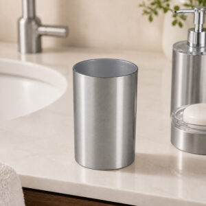Brushed aluminum bath tumbler cup holder Noumea in silver on a bathroom countertop