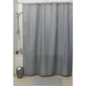 Gray shower curtain displayed in bathtub setup with matching mat