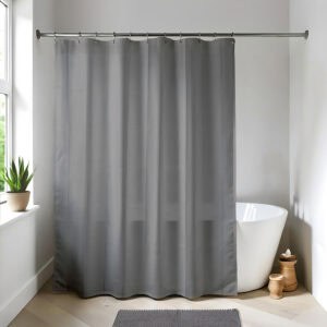 Gray shower curtain in a bright modern bathroom