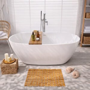 Bamboo bath mat on bathroom floor, in front of a bathtub