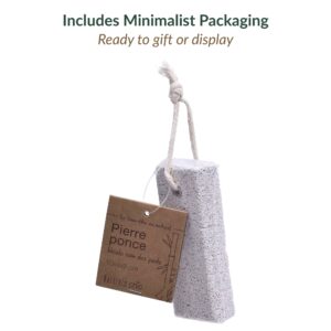 Pumice stone with Natural Chic brand cardboard tag attached by rope