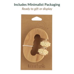 Muscle massage roller displayed in minimalist kraft paper packaging with hanging hole