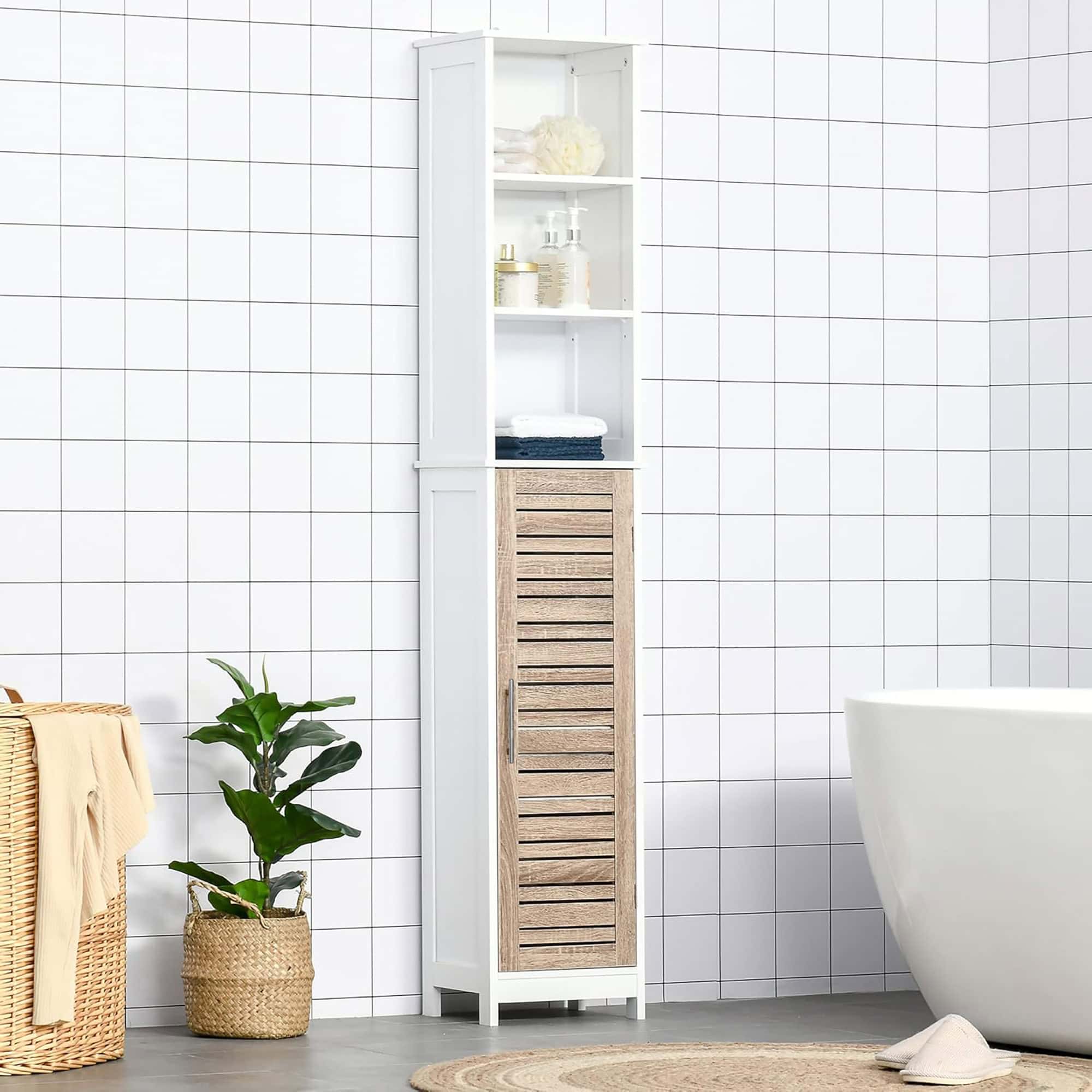 Tall bathroom cabinet styled in a modern setting: A tall bathroom cabinet placed in a modern bathroom setting, styled with neatly displayed towels and decorative accessories.