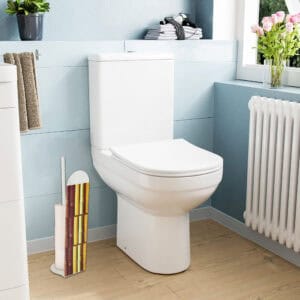 Bamboo-patterned toilet paper holder placed beside modern white toilet in bright bathroom interior