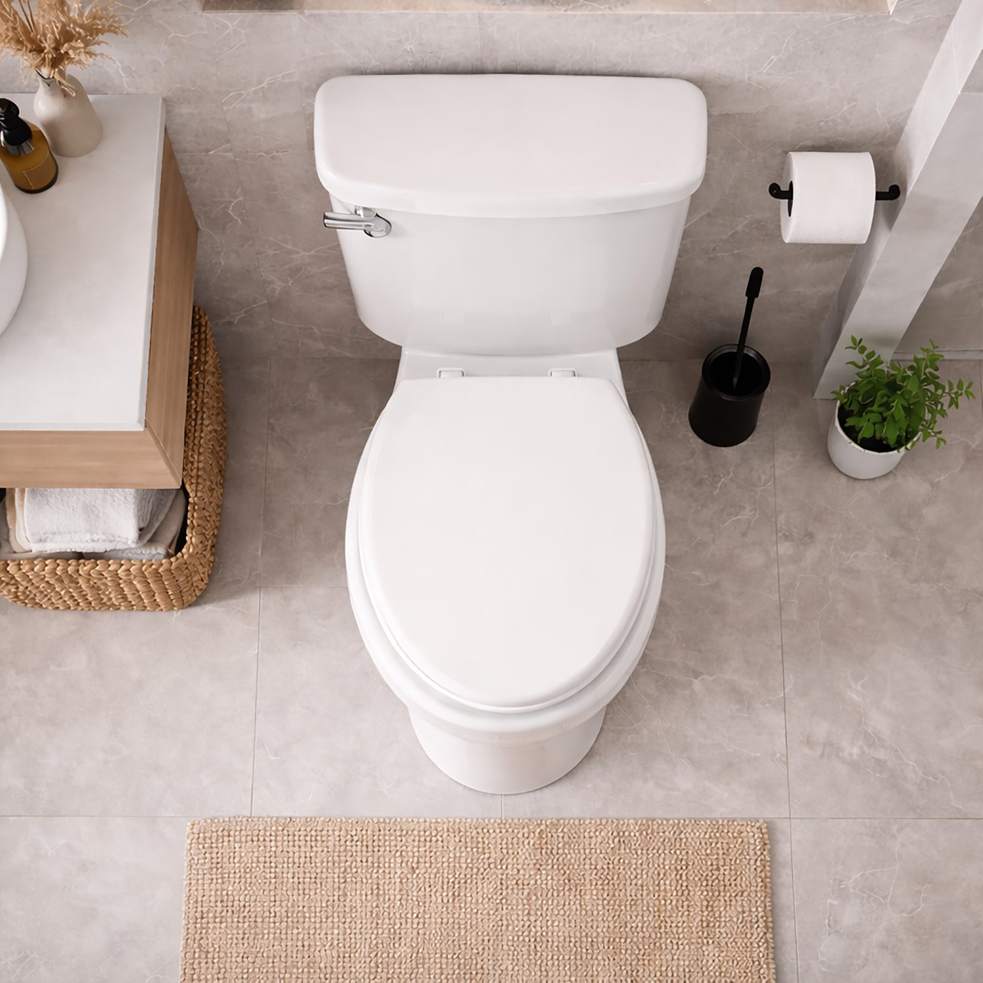 Top view of white elongated toilet seat installed on toilet in modern bathroom
