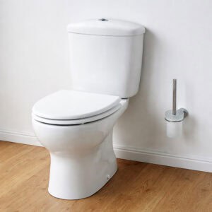 Side view of white elongated toilet with matching elongated toilet seat closed