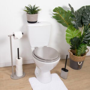Taupe round toilet seat installed in modern bathroom setting