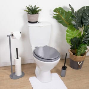 Gray round toilet seat installed in modern bathroom setting