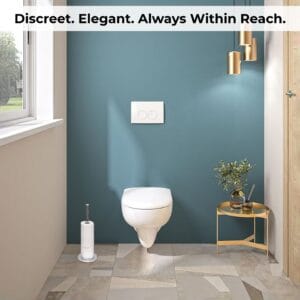 Silver toilet paper holder beside a wall-mounted toilet in a contemporary bathroom