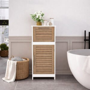 "Brown oak and white bathroom floor cabinet styled with flowers and candles beside a bathtub"