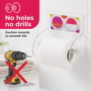 Eclats clear acrylic toilet paper holder on tile holding a white roll, with a crossed-out drill. "No holes no drills" / "Suction mounts to smooth tile".