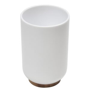 White tumbler cup with bamboo base on white background