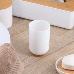 White bamboo base tumbler on bathroom countertop