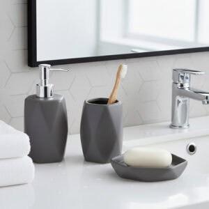 Matte gray bathroom accessory set with tumbler soap dispenser soap dish