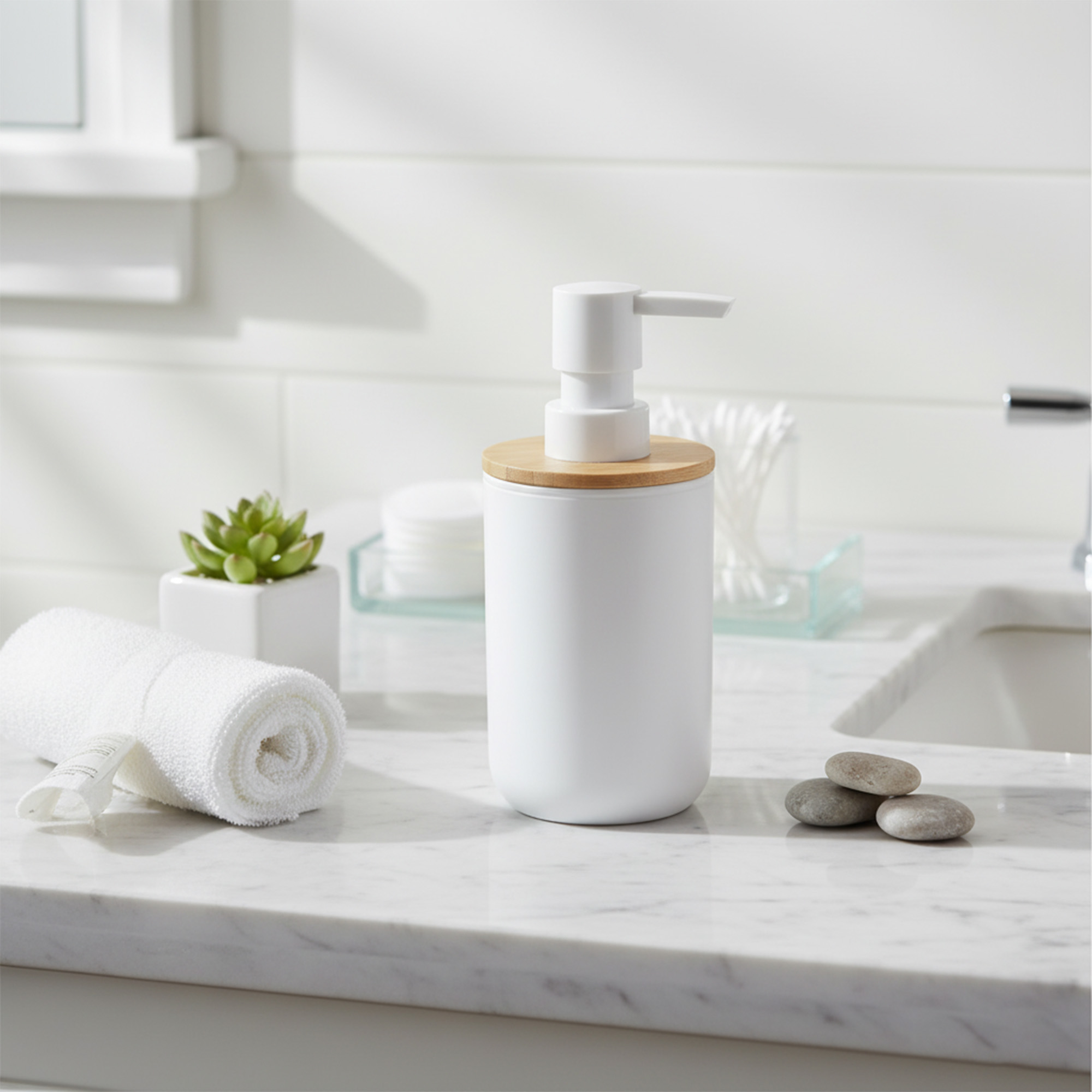 White bamboo soap dispenser styled on bathroom countertop