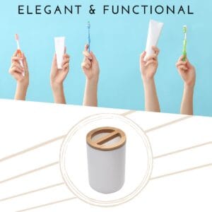 White toothbrush holder with bamboo top shown in use with toothpaste and brushes