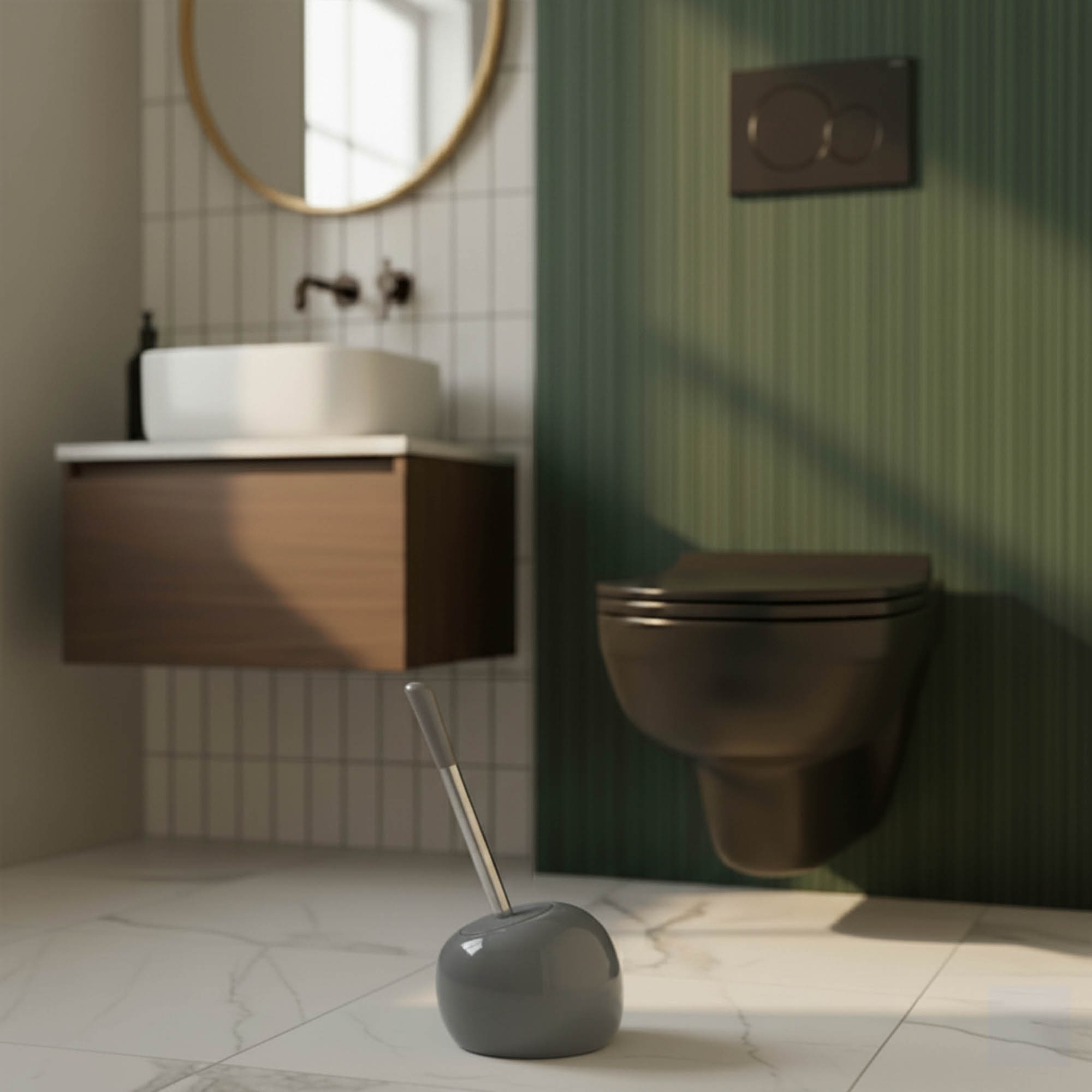 Grey spherical toilet brush holder with stainless steel handle in contemporary bathroom with green wall