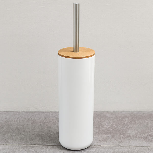 White toilet brush holder with bamboo lid and stainless steel handle against neutral wall