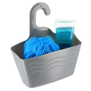 Grey hanging shower caddy with blue loofah and shower gel on white background