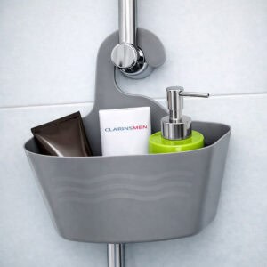 Grey plastic hanging shower caddy on shower rod with toiletries and green soap dispenser