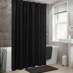 Black shower curtain in a contemporary bathroom