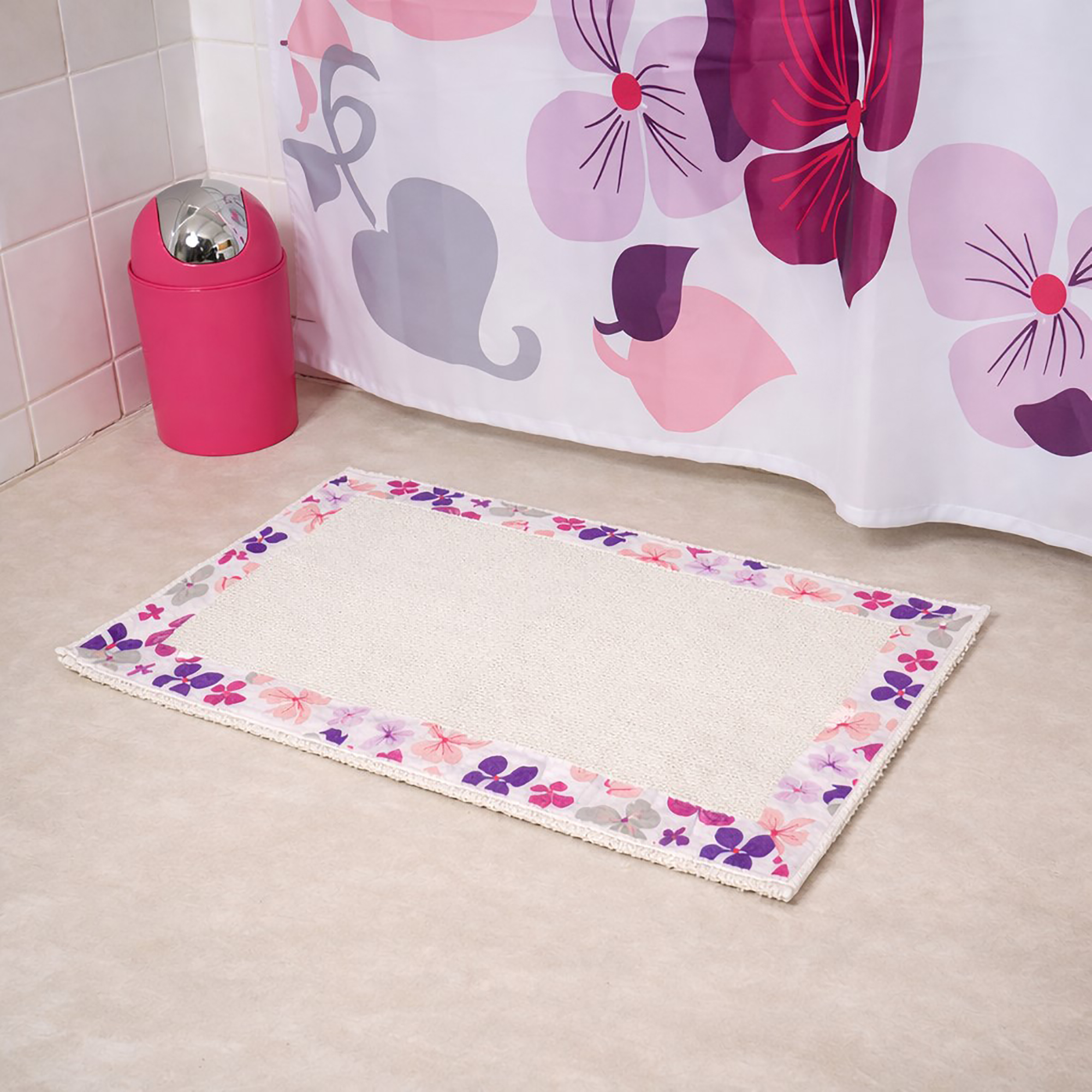 Purple floral bathroom mat with matching shower curtain