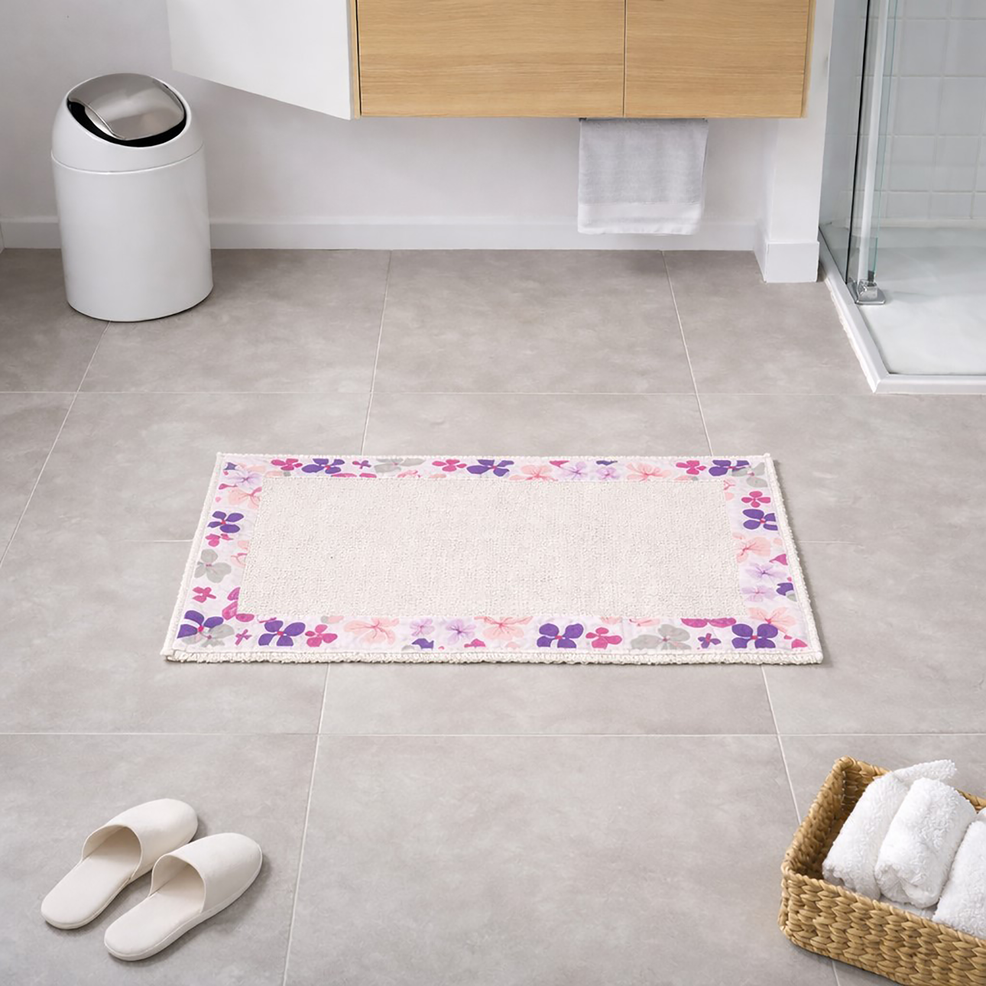 Purple floral border cotton bathroom mat on floor