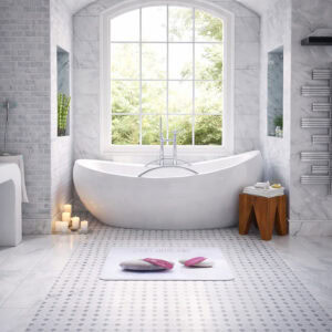 "'Zen attitude' bath mat in front of freestanding tub in elegant marble bathroom with candles"
