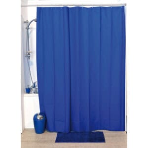 Navy blue curtain in a cozy bathroom with bathtub