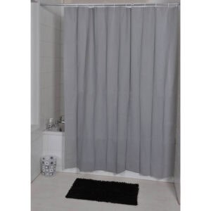 Gray curtain in a cozy bathroom with bathtub