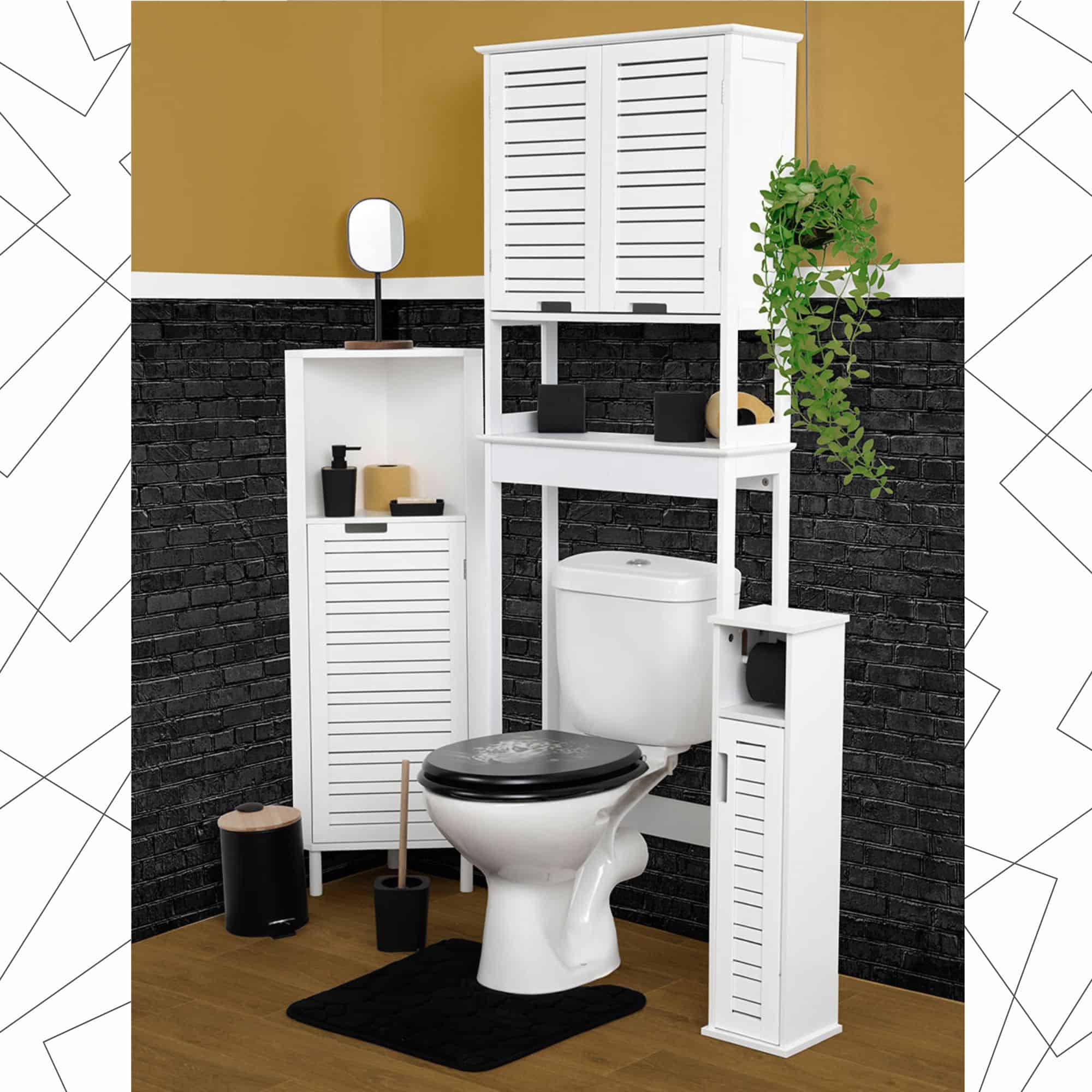 “White over-the-toilet cabinet displayed with matching bathroom furniture set against black brick wall”