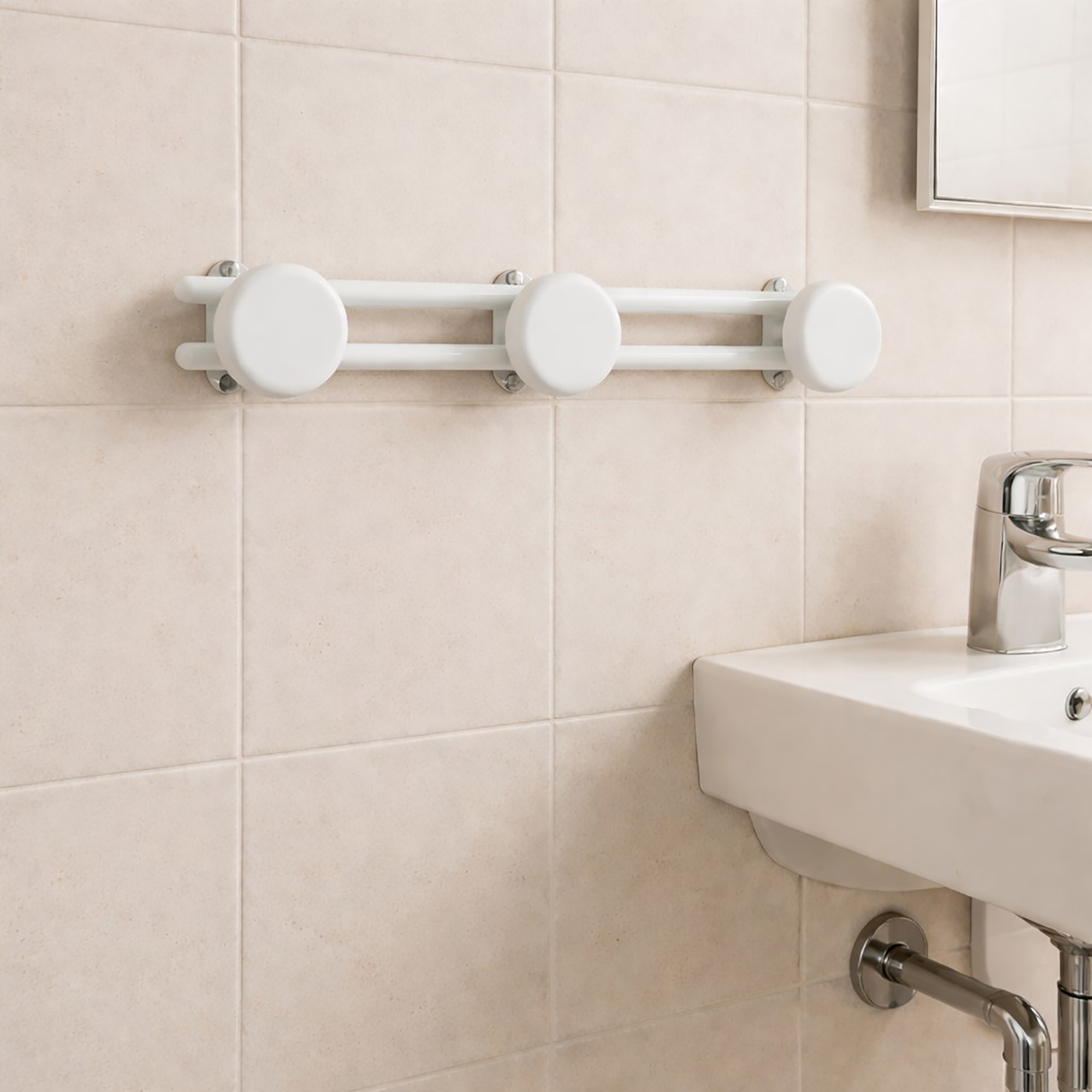 Image 3: White wall-mounted hook rail with 3 round disc hooks, mounted empty on a beige tiled bathroom wall beside a sink.