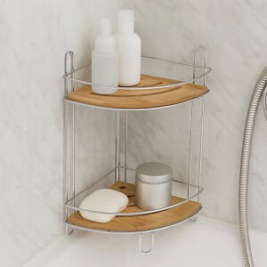 Image 3: Chrome 2-shelf corner storage tower with bamboo shelves holding shampoo bottles, soap, and a canister against a marble-effect bathroom wall.
