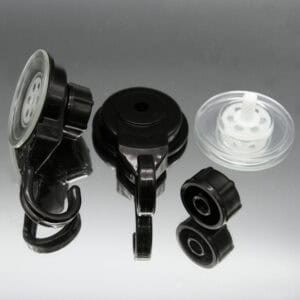 Black suction cup hook disassembled showing three components: hook unit, base, and clear suction cup