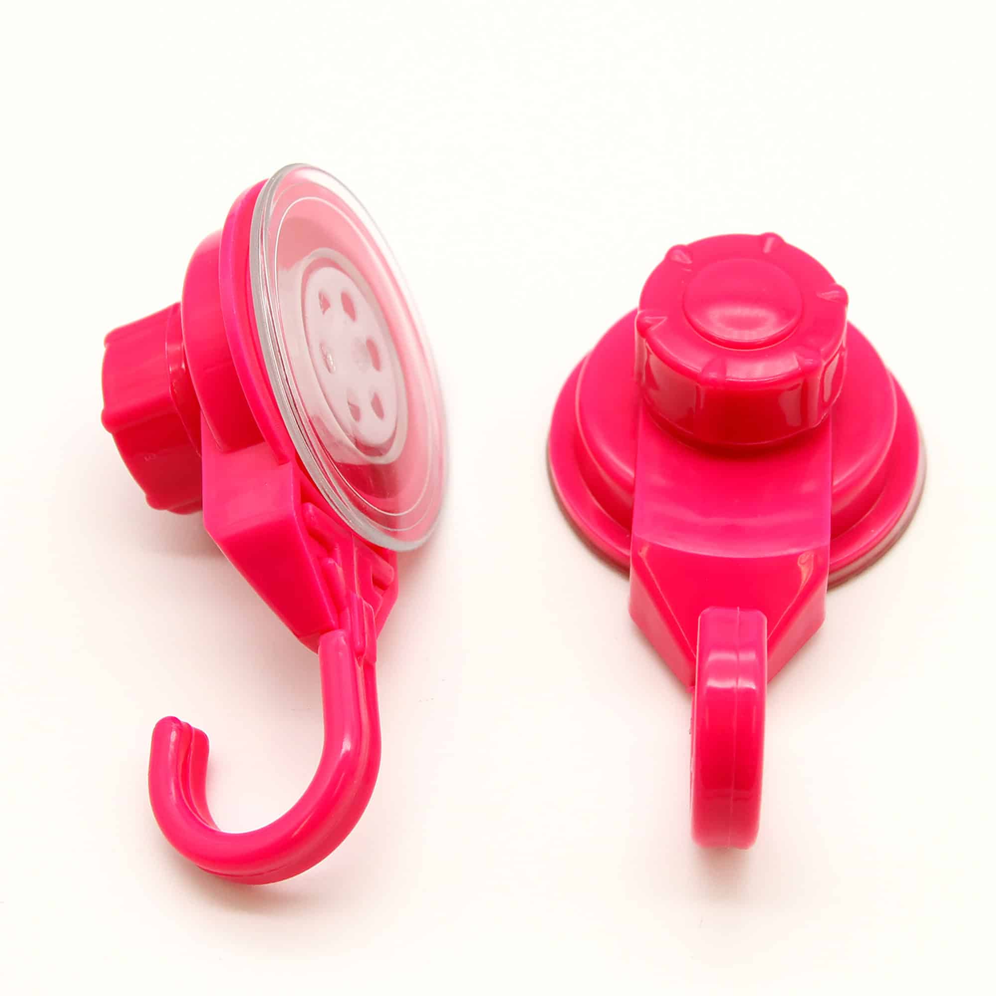 Two hot pink vacuum suction cup hooks shown front and back view on white background