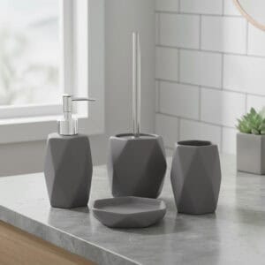 Matte gray bathroom accessory set styled on modern vanity