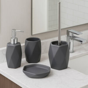 Gray diamond-shaped bathroom accessory set including soap dispenser, tumbler, toilet brush, and soap dish on white vanity