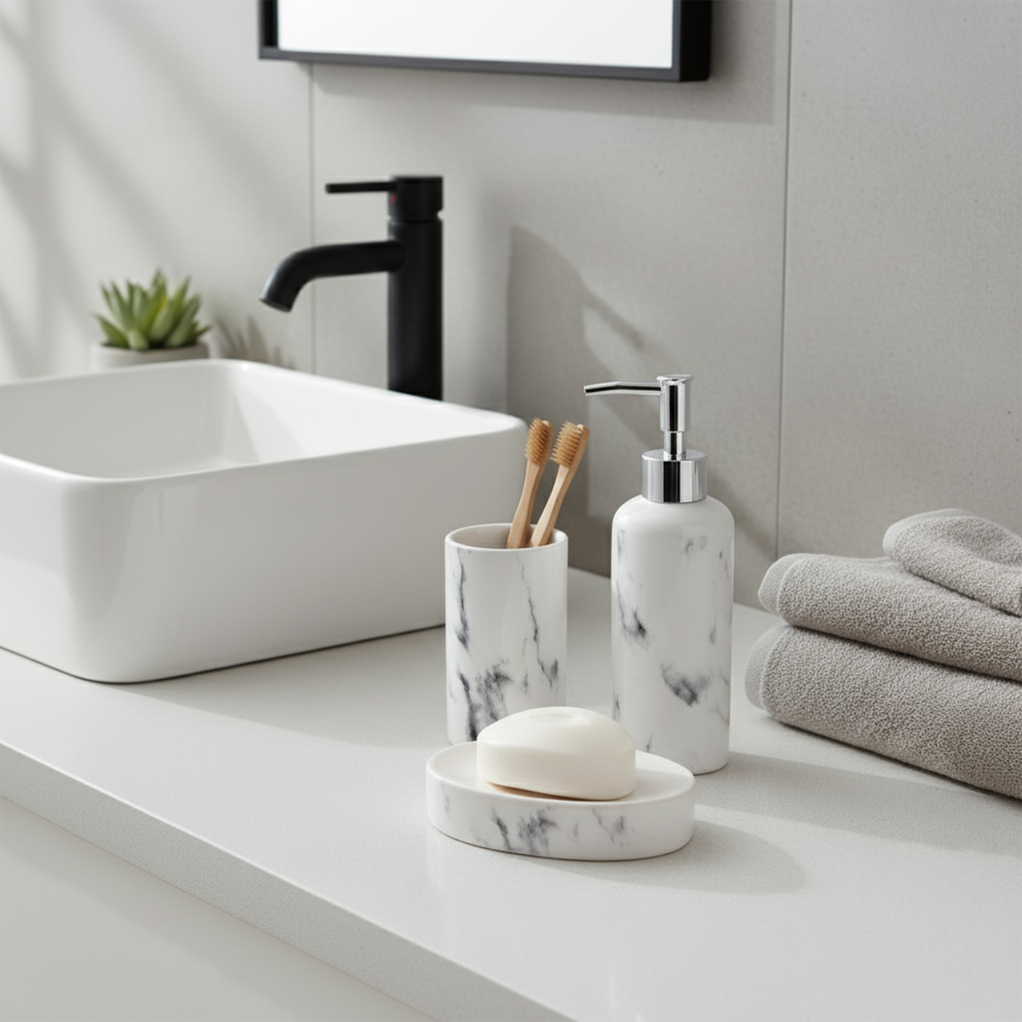 White marble effect bathroom tumbler with toothbrushes on vanity