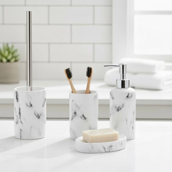 Marble bathroom set on countertop with toothbrushes, soap dish, and dispenser